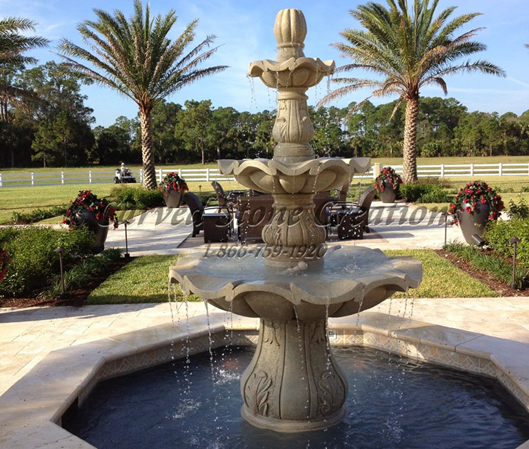 3-Tier Scalloped Fountain carved of Golden Cypress Granite in a customers existing Octagonal Pool Surround.