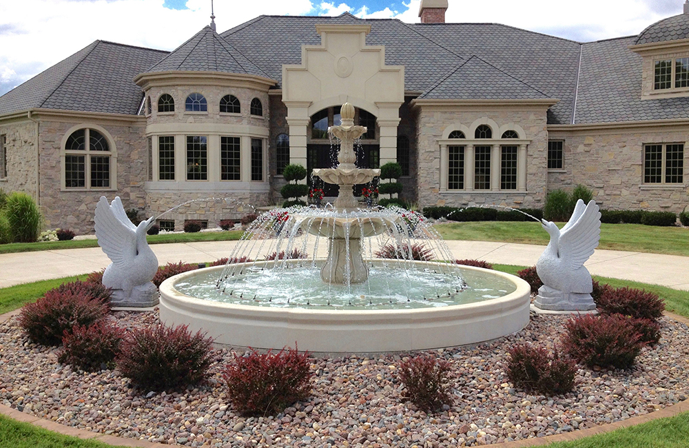 3-Tier scalloped Fountain (54 Inch x 96 inch tall) in a 14 ft diameter x 14 inch tall Cypress Pool Surround, with (2) exterior mounted California White Granite Swan Spitter fountains.