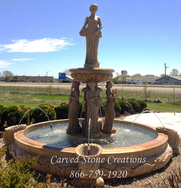 5 Goddess Fountain in a Cornucopia Pool surround, carved of Giallo Fantasia Granite