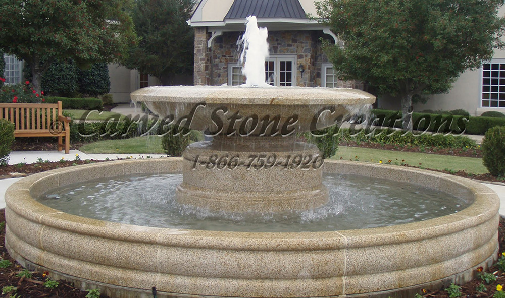 6 Ft diameter Urn fountain in a 14 Ft Diameter x 14 Inch Tall Tuscan Pool Surround, both items carved of Giallo Fantasia Granite
