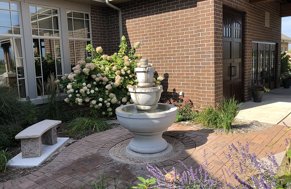 3-tier Self Contained Fountain at local Green Bay WI church, carved of Golden Cypress Granite, and filled with a hose (rather than an autofill.)