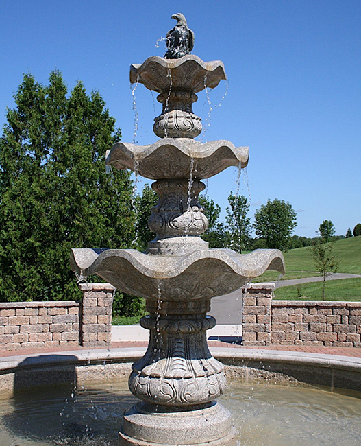 3-Tier Scalloped Fountain carved of Wild Rose Granite with a bronze Eagle Statue as an finial at the top.