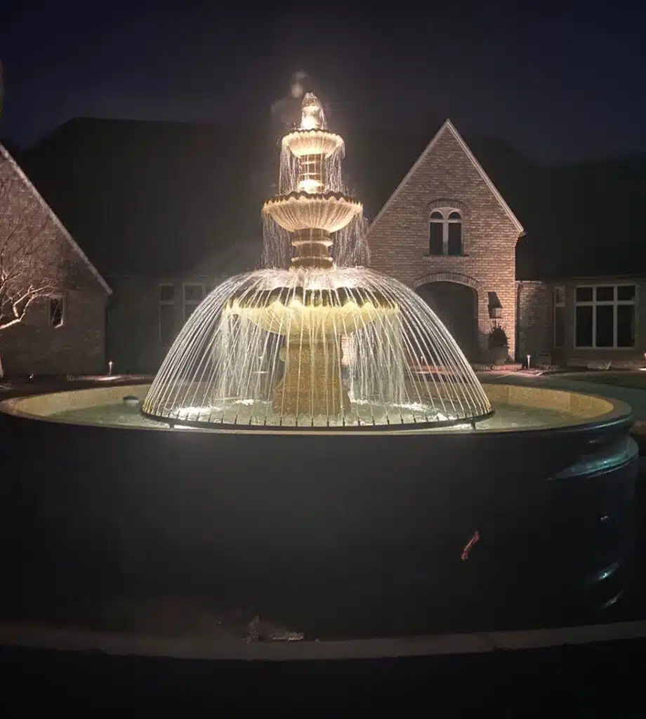 Large 3-Tier Classical Fountain in Granite Pool Surround with Copper Spray Ring and Lit Centerpeice.